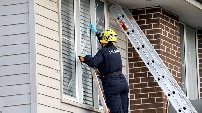 Forensics mark out bullet holes in the house. Picture: NewsWire / Damian Shaw