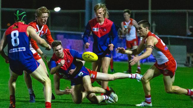 Jayden Charlton (centre), sustained a shoulder injury for North Hobart last weekend. Picture: Solstice Digital