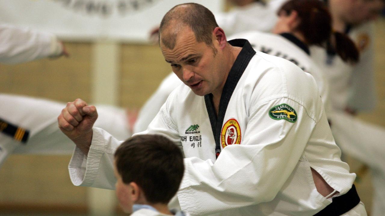 Dale Eagling Taekwondo at Moonah Community Centre, Hugh Eagling passes on his knowledge to the children in 2005.