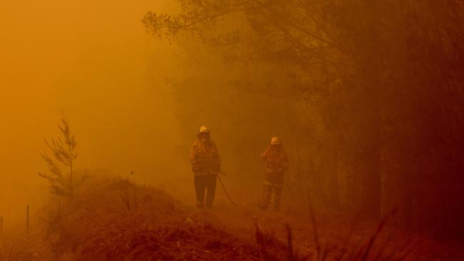 Firefighters in Moruya, south of Batemans Bay, in New South Wales. Picture: AFP