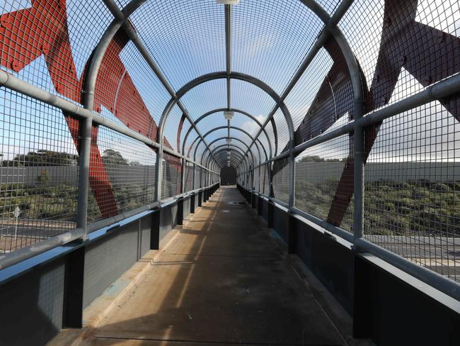 Some of the bridges, both pedestrian and vehicle, along the Southern Expressway. Today construction teams are installing mesh over the rocks at a few of the expressway bridges, which along with numbering the bridges and more police patrols, is an attempt to curtail rock throwing at cars on the expressway. 18 June 2018. (AAP Image/Dean Martin)
