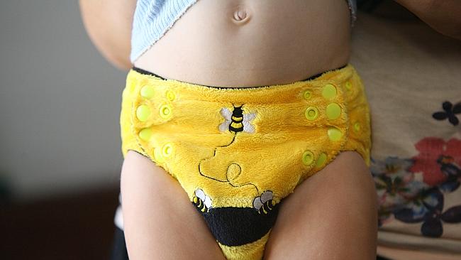 Toilet-training taking longer ... Two-year-old Ned Foley showing off a Bumble Bee nappy. 