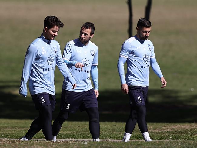 SYDNEY, AUSTRALIA - AUGUST 25: Alexander Baumjohann, Adam le Fondre and Kosta Barbarouses of Sydney FC arrive during a Sydney FC A-League training session at Macquarie Uni on August 25, 2020 in Sydney, Australia. (Photo by Ryan Pierse/Getty Images)