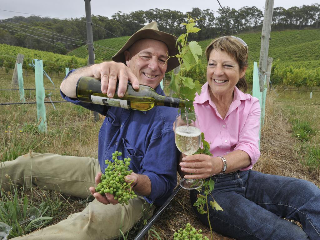 Hahndorf Hill winemaker Larry Jacobs, with Prue Henschke, enjoying a drop of wine in the Adelaide Hills region. Picture: Supplied