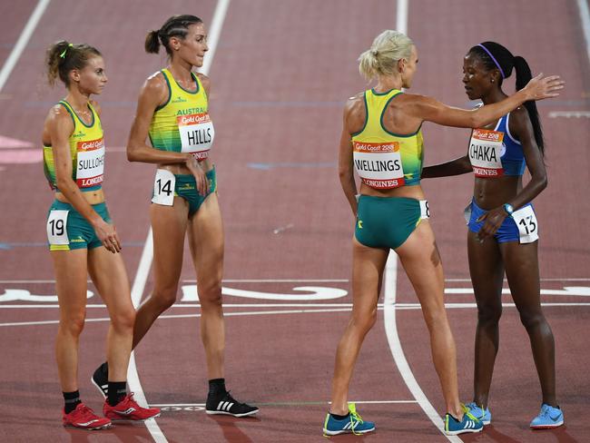 Celia Sullohern, Madeline Hills, Eloise Wellings of Australia congratulate Lineo Chaka of Lesotho. Picture: Dean Lewins