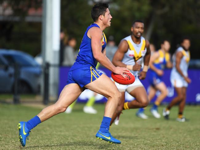 Jackson Sketcher on the go for Noble Park. Picture: James Ross/AAP