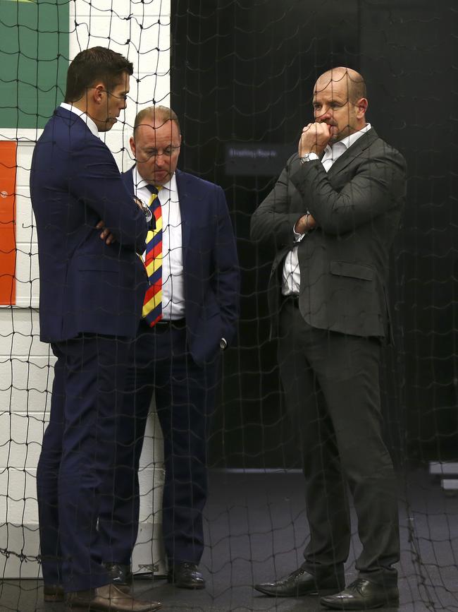 Crows boss Andrew Fagan, chairman Rob Chapman and board member Mark Ricciuto in the rooms after the 2017 Grand Final loss. Picture: Sarah Reed