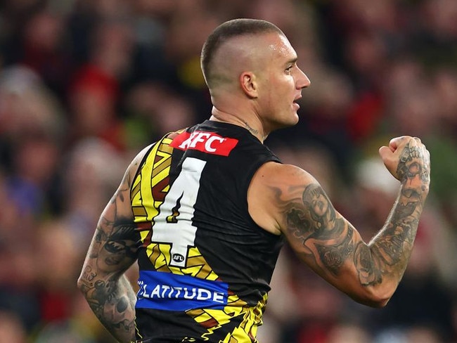 MELBOURNE, AUSTRALIA - MAY 25: Dustin Martin of the Tigers celebrates kicking a goal during the round 11 AFL match between Richmond Tigers and Essendon Bombers at Melbourne Cricket Ground, on May 25, 2024, in Melbourne, Australia. (Photo by Quinn Rooney/Getty Images)