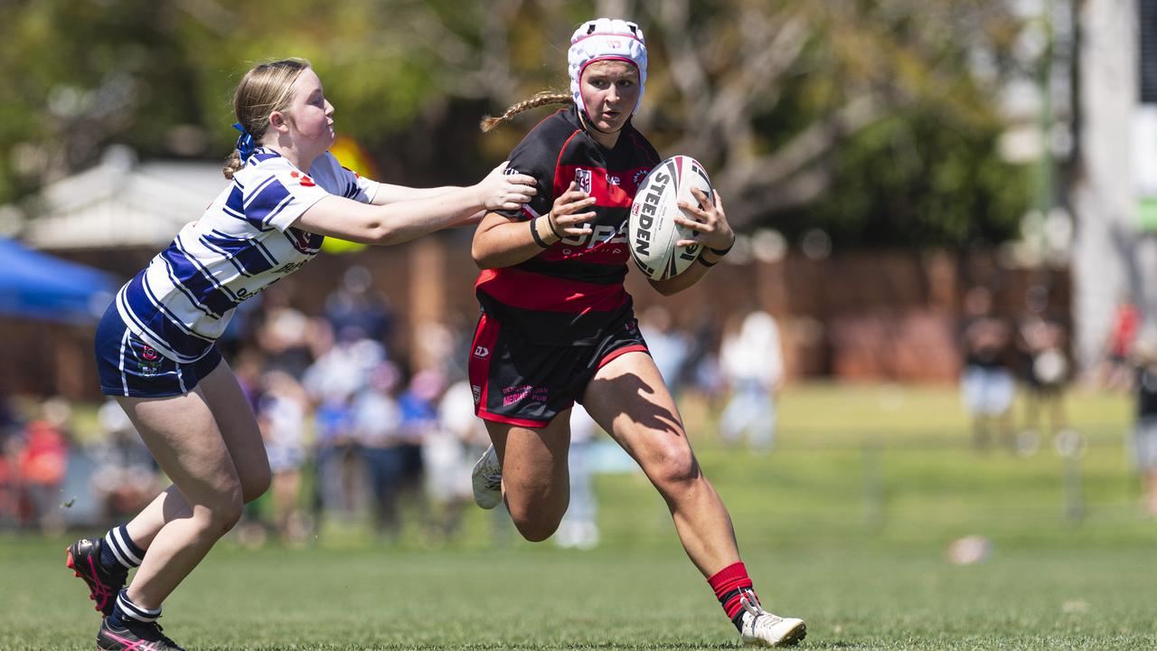 Alara Williams of Valleys gets away from Paiten Greig of Brothers in U15 girls Toowoomba Junior Rugby League grand final at Toowoomba Sports Ground, Saturday, September 7, 2024. Picture: Kevin Farmer