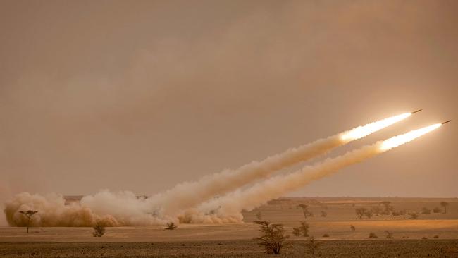 US M142 High Mobility Artillery Rocket System (HIMARS) launchers fire salvoes during the "African Lion" military exercise in the Grier Labouihi region in southeastern Morocco.