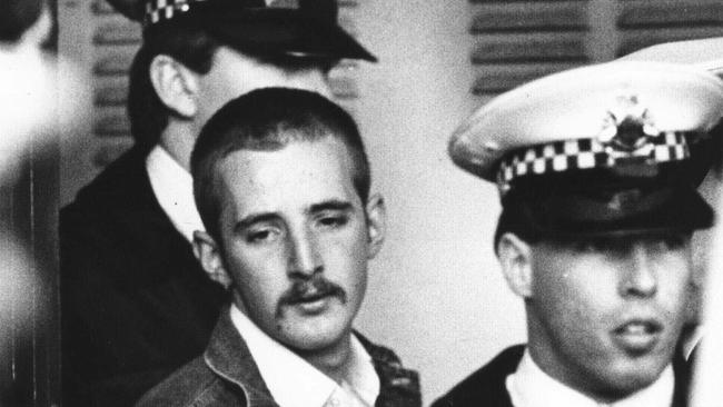 Under heavy police guard, Julian Knight, 19, who shot dead 7 people and wounded 19 in Hoddle Street, Clifton Hill. Picture: Michael Potter