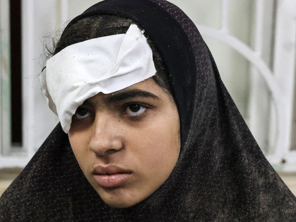 A wounded Palestinian woman sits in a hospital after an Israeli strike on Rafah in the southern Gaza Strip. Picture: AFP