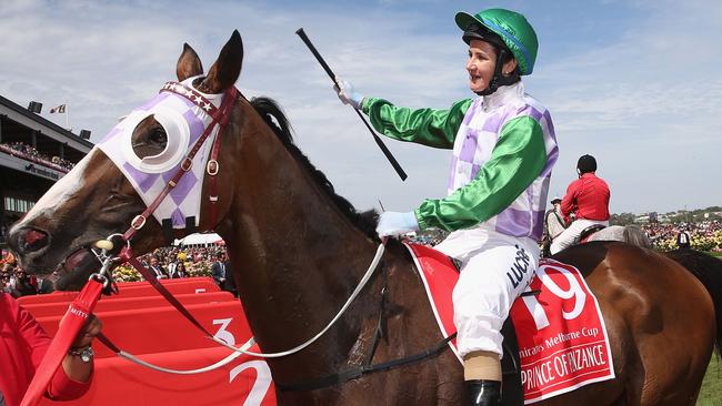 MELBOURNE, AUSTRALIA - NOVEMBER 03: Michelle Payne riding Prince Of Penzance returns to scale after winning race 7 the Emirates Melbourne Cup on Melbourne Cup Day at Flemington Racecourse on November 3, 2015 in Melbourne, Australia. (Photo by Michael Dodge/Getty Images)