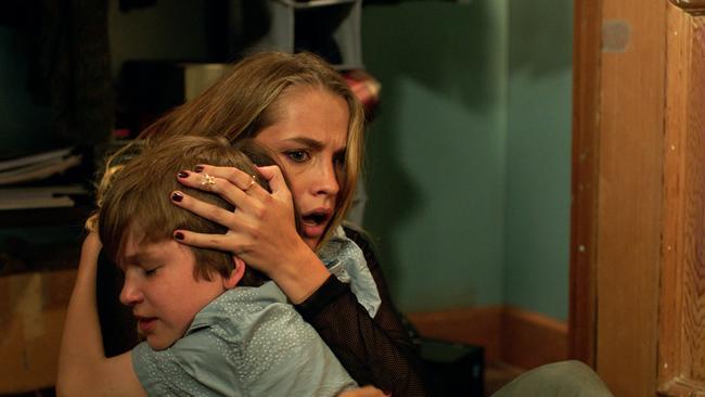 Gabriel Bateman and Teresa Palmer in horror movie Lights Out. Picture: Warner Bros