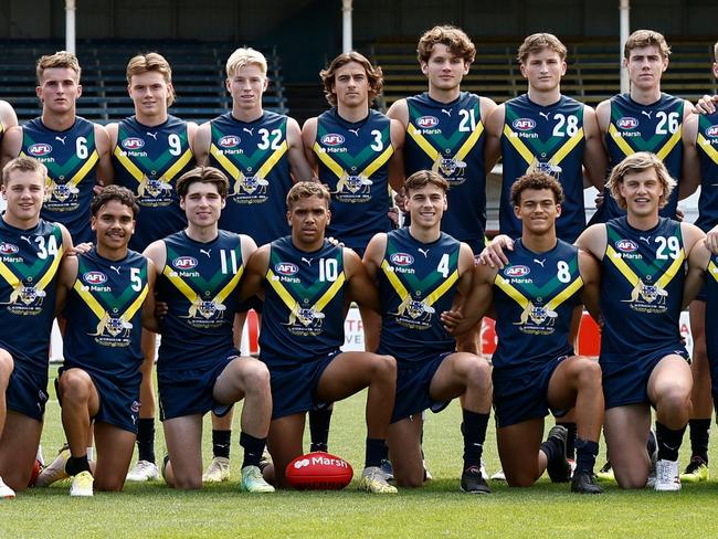 MELBOURNE, AUSTRALIA - APRIL 13: The AFL Academy team and support staff pose for a team photo before the 2024 AFL Academy match between the Marsh AFL National Academy Boys and Coburg Lions at Ikon Park on April 13, 2024 in Melbourne, Australia. (Photo by Michael Willson/AFL Photos via Getty Images)