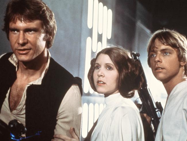 Originals are back ... Harrison Ford, Carrie Fisher, and Mark Hamill are shown in a scene from Star Wars. Picture: AP