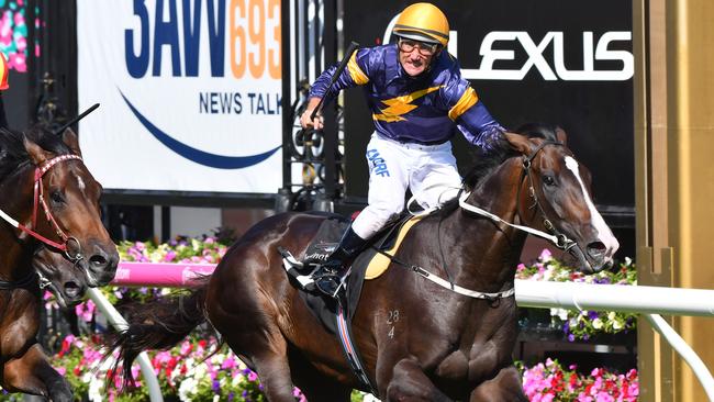 Damien Oliver celebrates Grunt’s Australian Guineas win. Picture: Getty Images