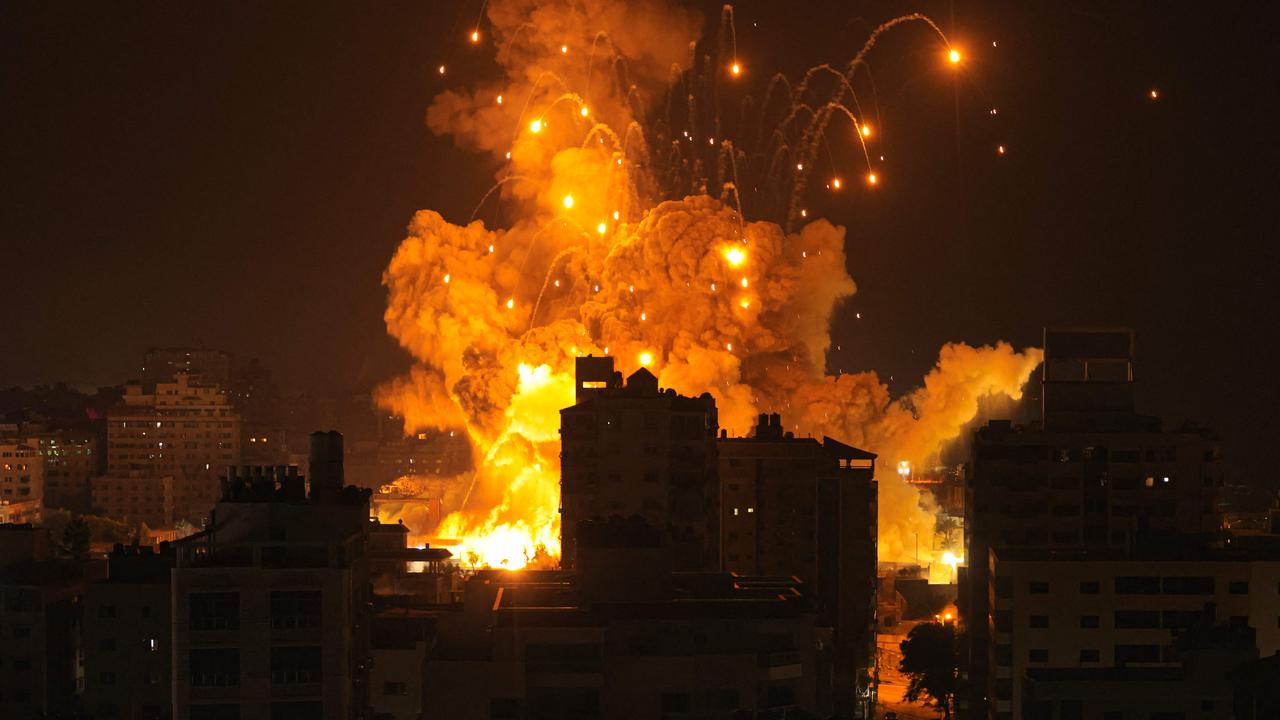 A missile explodes in Gaza City during an Israeli air strike. Picture: AFP