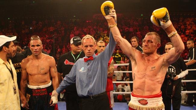 Garth Wood celebrates after his fifth round knockout victory against three-time boxing world champion Anthony Mundine in 2010.