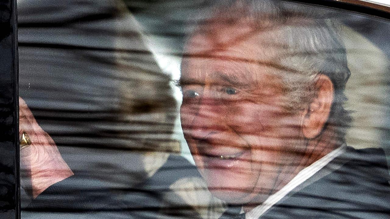King Charles III looked in a positive mood in. (Photo by HENRY NICHOLLS / AFP)