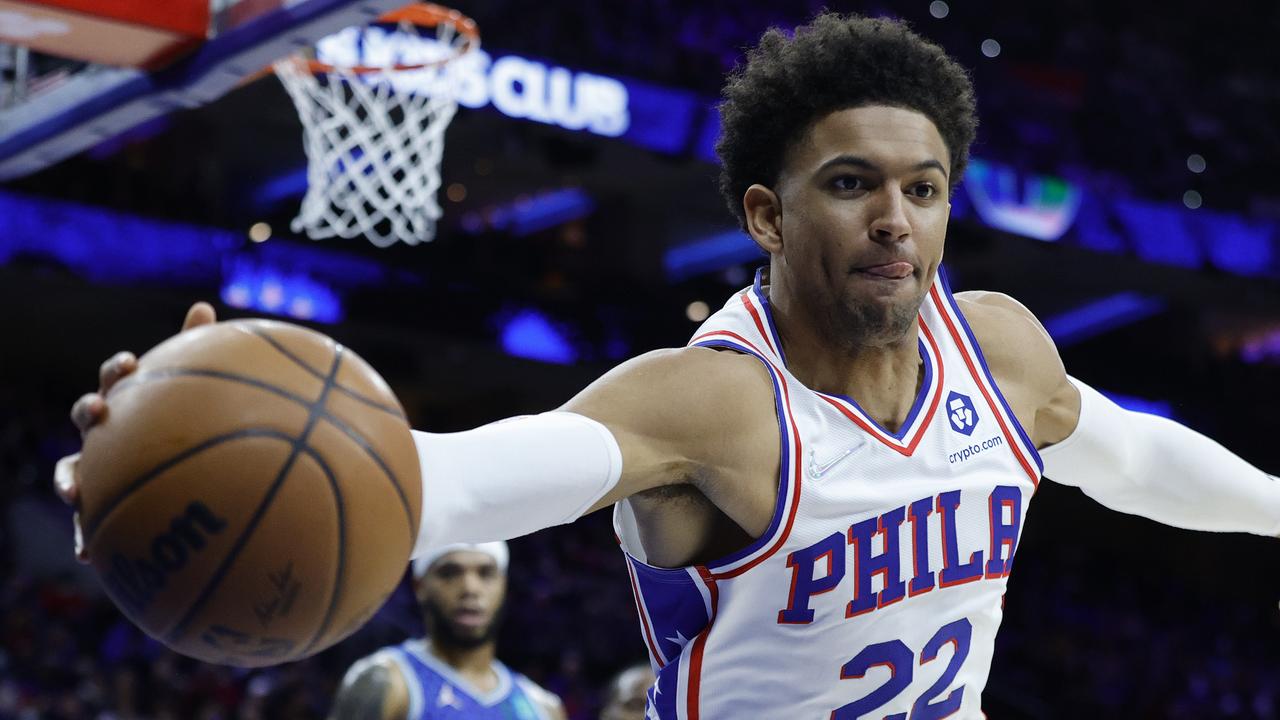 PHILADELPHIA, PENNSYLVANIA - JANUARY 12: Matisse Thybulle #22 of the Philadelphia 76ers chases a loose ball during the second quarter against the Charlotte Hornets at Wells Fargo Center on January 12, 2022 in Philadelphia, Pennsylvania. NOTE TO USER: User expressly acknowledges and agrees that, by downloading and or using this photograph, User is consenting to the terms and conditions of the Getty Images License Agreement. (Photo by Tim Nwachukwu/Getty Images)