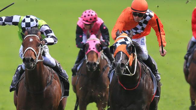 Tye Angland (right) produced a great ride on Ace High to win the Spring Champion Stakes. Picture: Jenny Evans