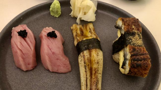 Otoro tuna, sea eel and freshwater eel nigiri sushi.