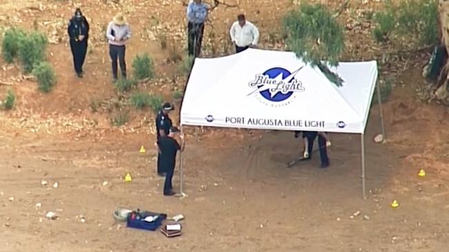 Major Crime detectives and forensic police at what they think is a shallow grave in the Flinders Ranges, north of Hawker. Picture: Nine News