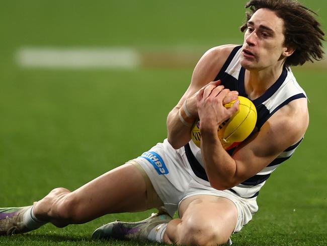 Gryan Miers slides in to mark. Picture: Graham Denholm/Getty Images