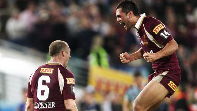 Darren Lockyer and Karmichael Hunt celebrate match and series victory after Game 2 of NSW v Queensland State of Origin series at ANZ Stadium, Olympic Park, Homebush in Sydney.