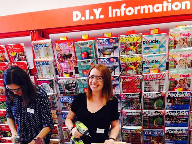 Home Focus DIYJournalist Chelsea Clark with DIY planter box made at Bunnings workshop