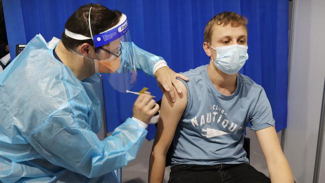 Jacob Sutton 28, getting the AstraZeneca vaccine at MCEC. Picture: David Caird