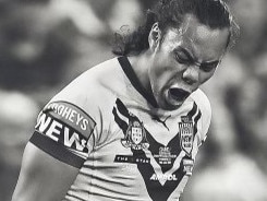 Jarome Luai gives it to Felise Kaufusi during Origin I in Townsville.