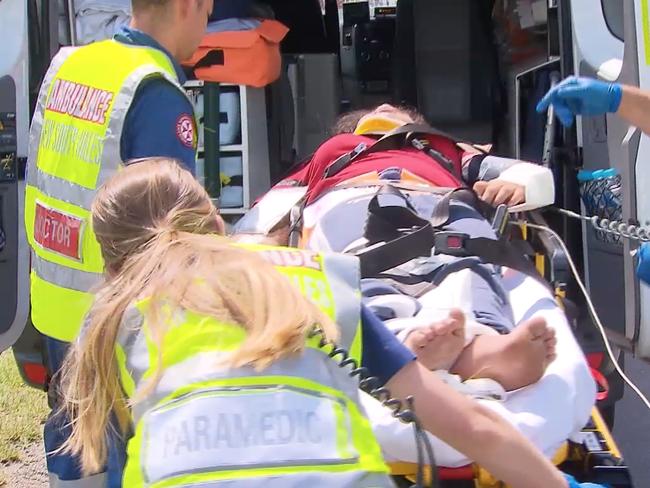 One of the injured passengers being loaded into the ambulance. Picture: John Tesoriero