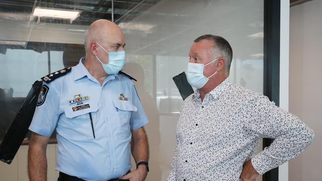 Acting Chief Superintendent Chris Hodgman speaks with Member for Cairns Michael Healy in the Cairns City Police Station, currently under construction. Picture: Brendan Radke