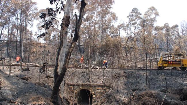 Crews clear the railway line at Zig Zag Railway, near Lithgow. Picture: Zig Zag Railway Facebook