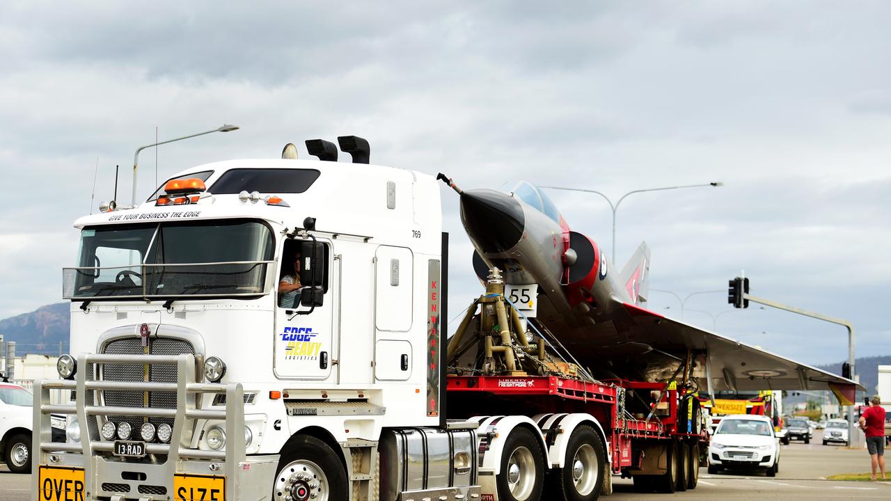 Two restored Royal Australian Air Force aircraft veterans- a Mirage fighter jet A3-55 and a Winjeel Trainer??? A85-403 - arrived at Townsville RAAF Base. Picture: Alix Sweeney