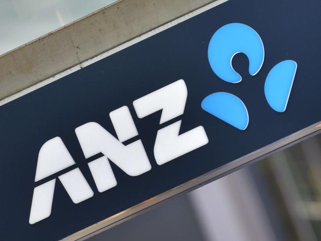 A sign for the Australia and New Zealand (ANZ) Banking Group is seen outside a branch in Sydney on May 5, 2015. ANZ posted a modest first half net profit rise of three percent to Aus$3.5 billion (US$2.7 billion), spurred by growth in both domestic and international operations. AFP PHOTO / Peter PARKS
