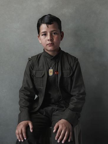 “It was in Newroz where I met a young Yezidi boy of about 11 or 12 years old” said Joey L. NYC photographer Joey L. travels to Iraqi Kurdistan and Syria to tell the story of guerilla groups fighting IS. Picture: Joey L.