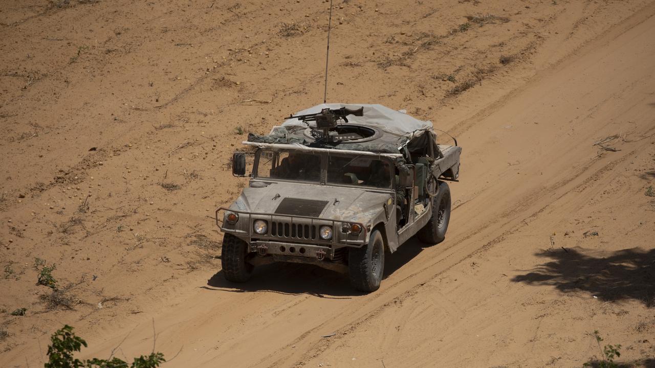 An Israeli vehicle moves near the border with the Southern Gaza Strip on May 7, 2024. (Photo by Amir Levy/Getty Images)