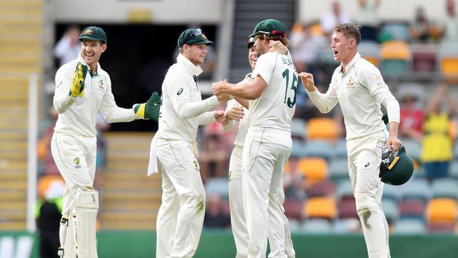 Steve Smith and David Warner are at the centre of Australia’s celebrations at the Gabba. Picture: Getty