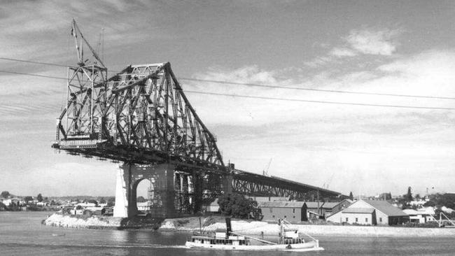 The Story Bridge under construction in 1939. Then premier William Forgan Smith organised finance for the public works. Picture: Geoffrey Powell