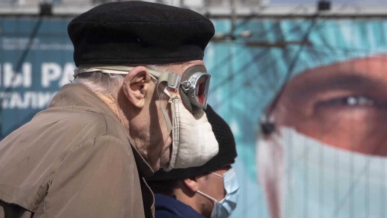 Wearing masks and gloves is now mandatory for residents visiting public places. Picture: Dmitri Lovetsky/AP