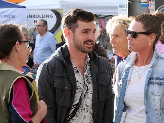 AU_2746537 - Gold Coast, AUSTRALIA  -  *EXCLUSIVE*  -  Ryan Bayldon-Lumsden Attends GGC Council Event - The Chrin Park Festival as advertised on Ryan Bayldon-Lumsden - New Facebook Page, Pictured with His Mother close by his side and anklet - Under his black jeans -  Pictured: Ryan Bayldon-Lumsden  BACKGRID Australia 7 OCTOBER 2023   BYLINE MUST READ: BackGrid / BACKGRID  Phone: + 61 419 847 429 Email:  sarah@backgrid.com.au