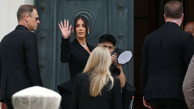 She waved to the crowd as she arrived at the Assize Court. Picture: Alain JOCARD / AFP
