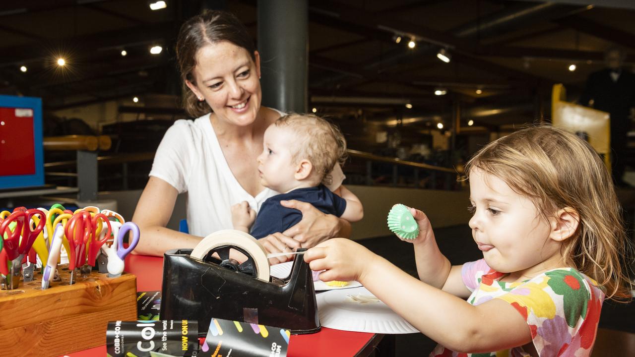 Georgie Morgan makes a flying object with mum Nikki Simpson and brother Henry Morgan as part of Cobb and Co Museum school holiday activities, Wednesday, January 4, 2023.