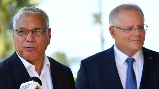 Liberal candidate for Gilmore Warren Mundine and Prime Minister Scott Morrison speak to media at Nowra Golf Club. Picture: AAP