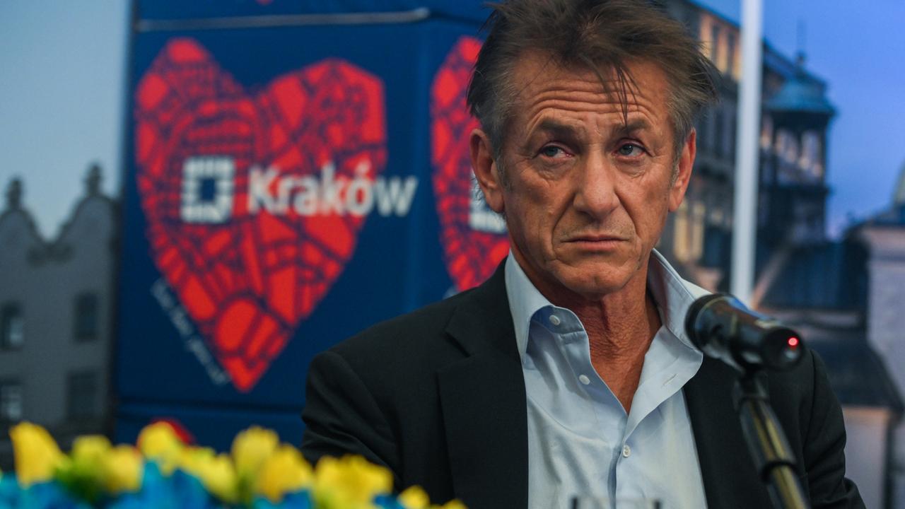 Sean Penn and the Mayor of Krakow, Jacek Majchrowski (not seen) speak to the press after signing a humanitarian contract at the City Hall. Picture: Omar Marques/Getty Images