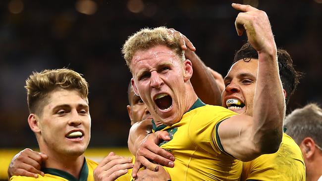 Reece Hodge celebrates scoring against the All Blacks earlier this year. Picture: Cameron Spencer/Getty