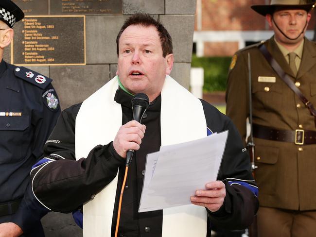 PIC: NORM OORLOFF..About 180 police riding away from the Victoria Police Memorial with a Victoria Police motorcycle escort. Chief Commissioner Ken Lay (L) and  Police Chaplain Paul Worsnop conduct a service before the riders head to Canberra